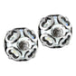 Brighton stud earrings with silver-plated openwork spheres and crystal accents on a white background