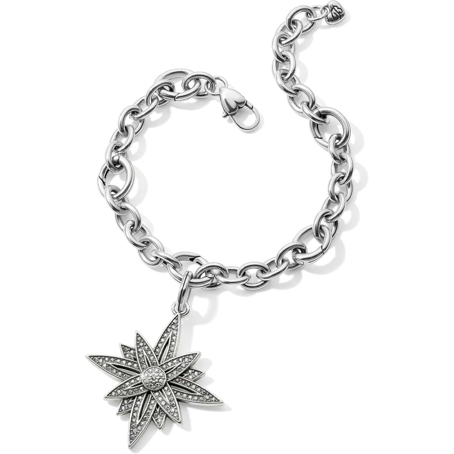 Brighton charm bracelet with silver-tone chain links and crystal-accented starburst pendant on a white background
