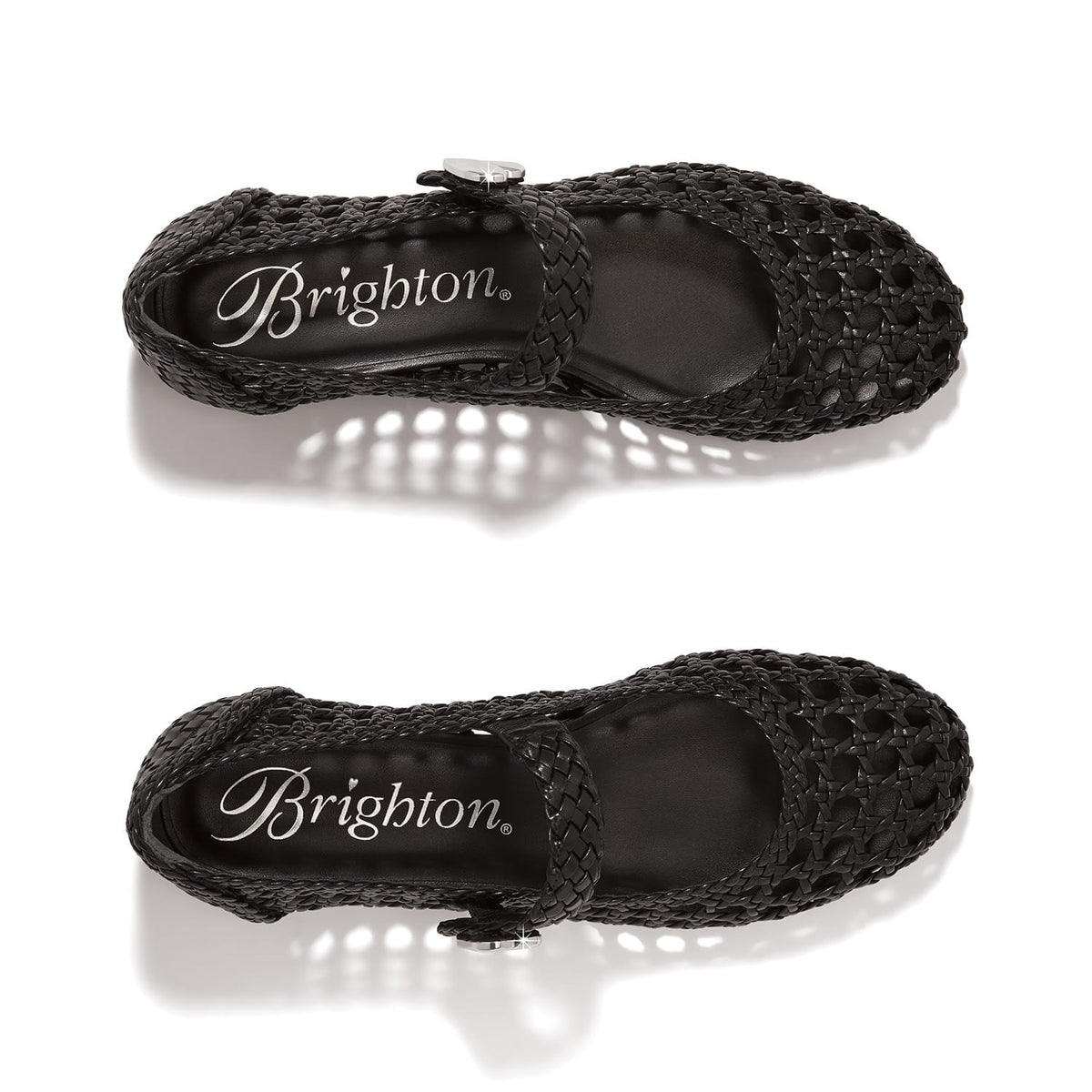 Brighton black woven leather Mary Jane flats with silver-tone heart button strap closure on a white background