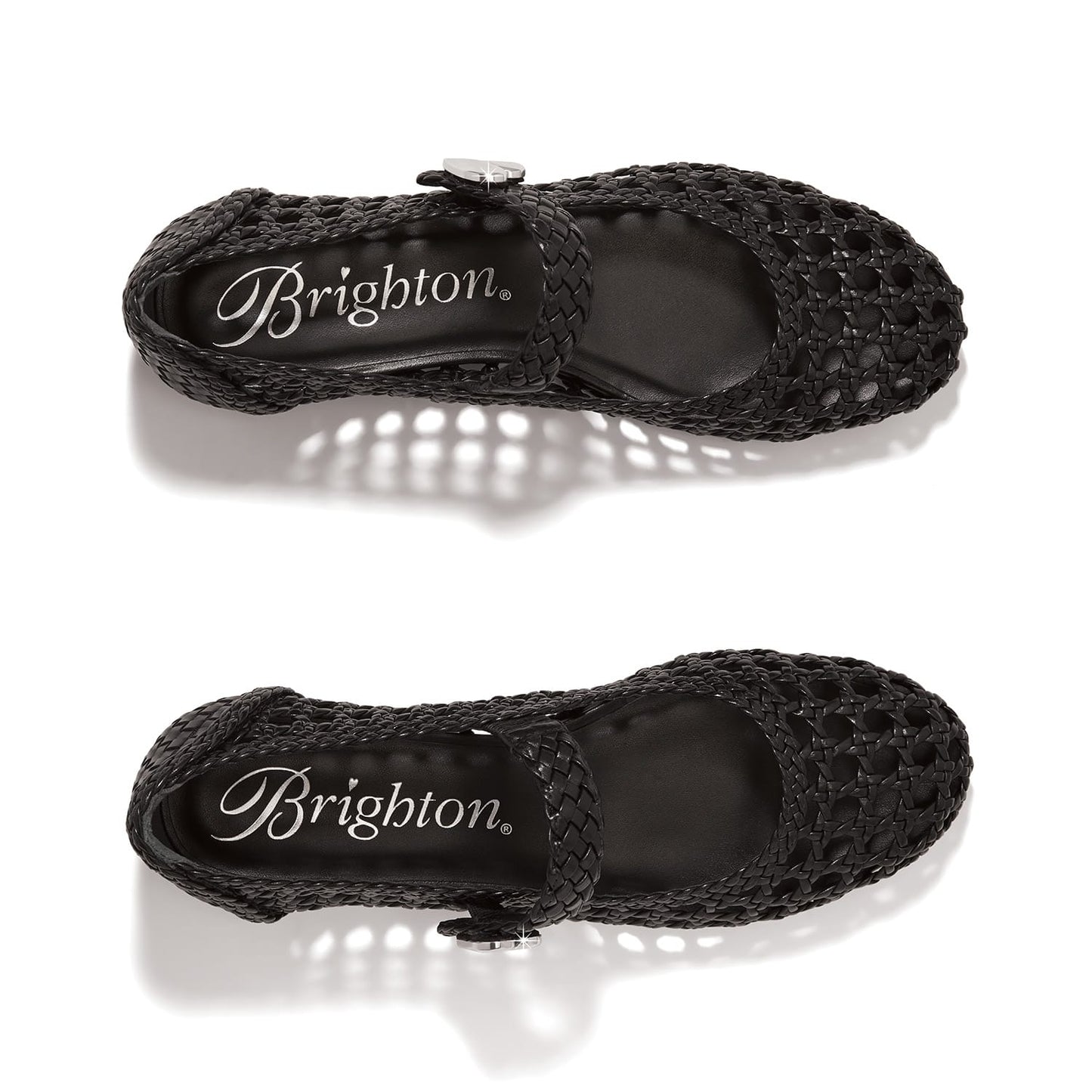 Brighton black woven leather Mary Jane flats with silver-tone heart button strap closure on a white background