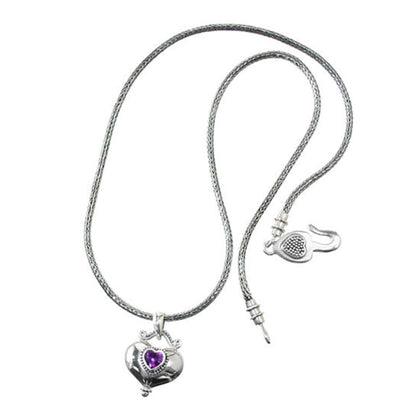 Brighton necklace in sterling silver with woven chain, heart pendant featuring purple crystal, and hook clasp on a white background