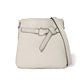 Brighton crossbody handbag in cream pebbled leather with studded belt detail and silver-tone ring on a white background