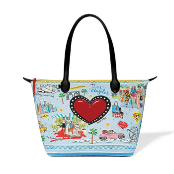 Brighton tote handbag with illustrated Los Angeles print, red heart accent, and black leather handles on a white background