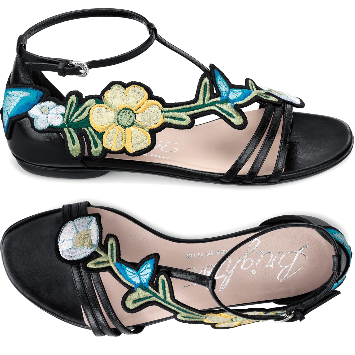 Brighton black leather ankle-strap sandals with embroidered floral and butterfly appliqués, shown from two angles on a white background