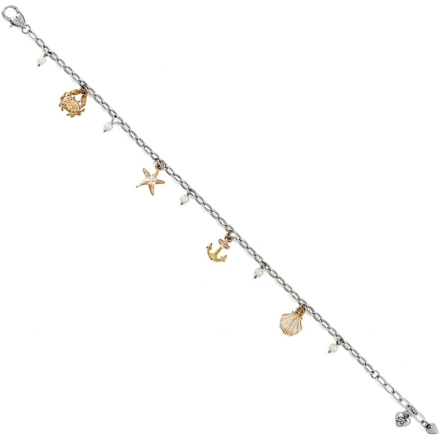 Brighton charm bracelet with silver-plated chain, brushed gold sea charms, and glass pearl accents on a white background