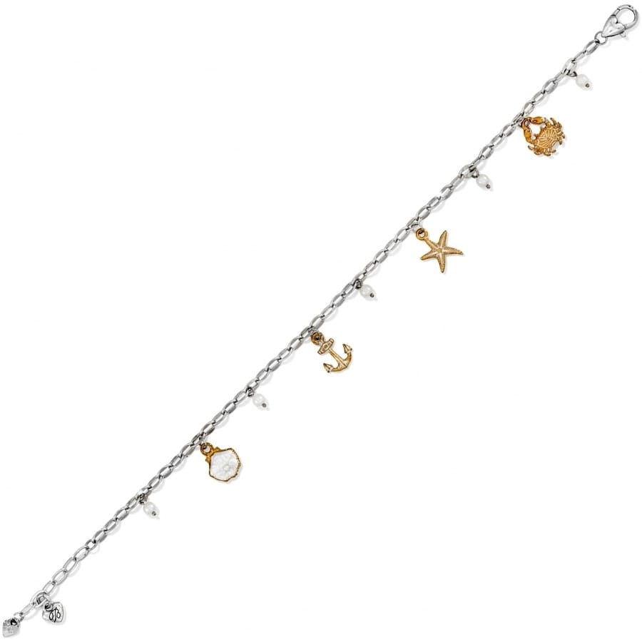 Brighton charm bracelet with silver-plated chain, brushed gold sea charms, and glass pearl accents on a white background