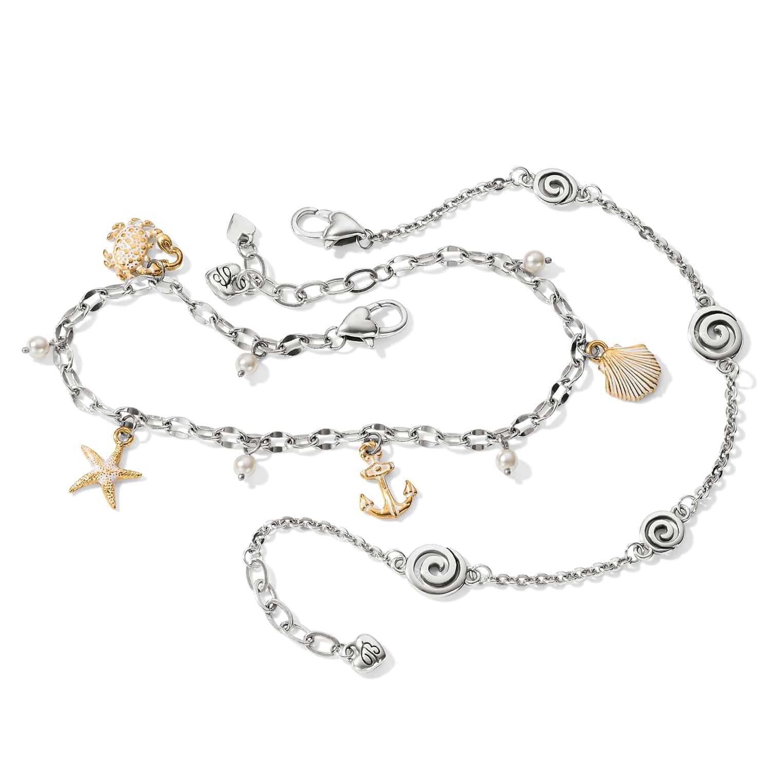 Brighton charm bracelet and anklet set with silver-plated swirls, brushed gold sea charms, and glass pearls on a white background