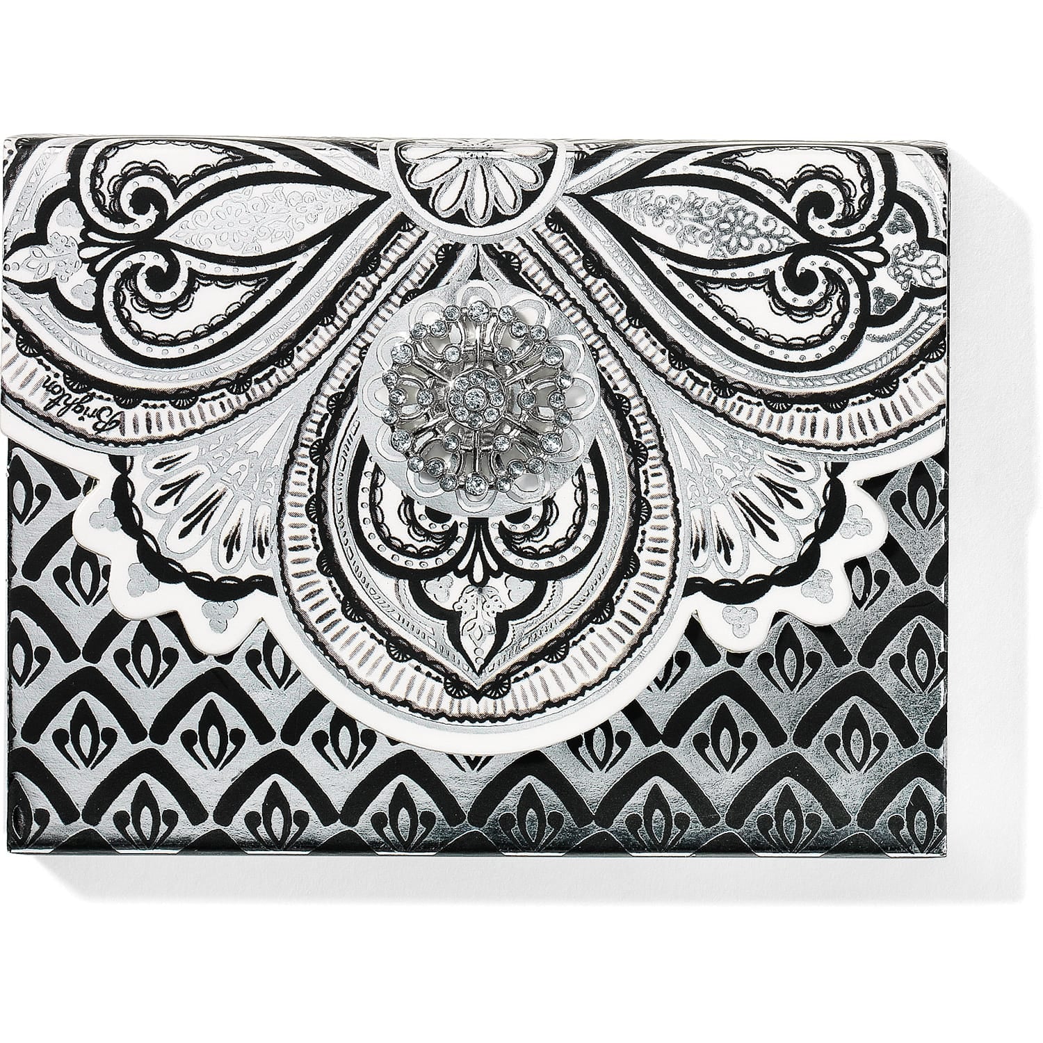 Brighton card case with black and silver ornamental scroll print and crystal medallion accent on a white background