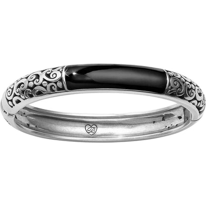Brighton bangle bracelet with silver-plated scrollwork detailing and black enamel top panel on a white background