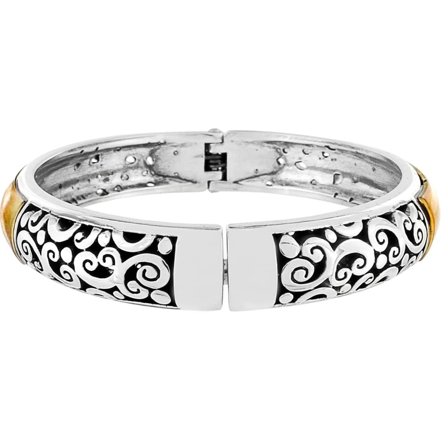 Brighton hinged bangle bracelet with silver-plated scroll filigree design and gold-plated accents on a white background