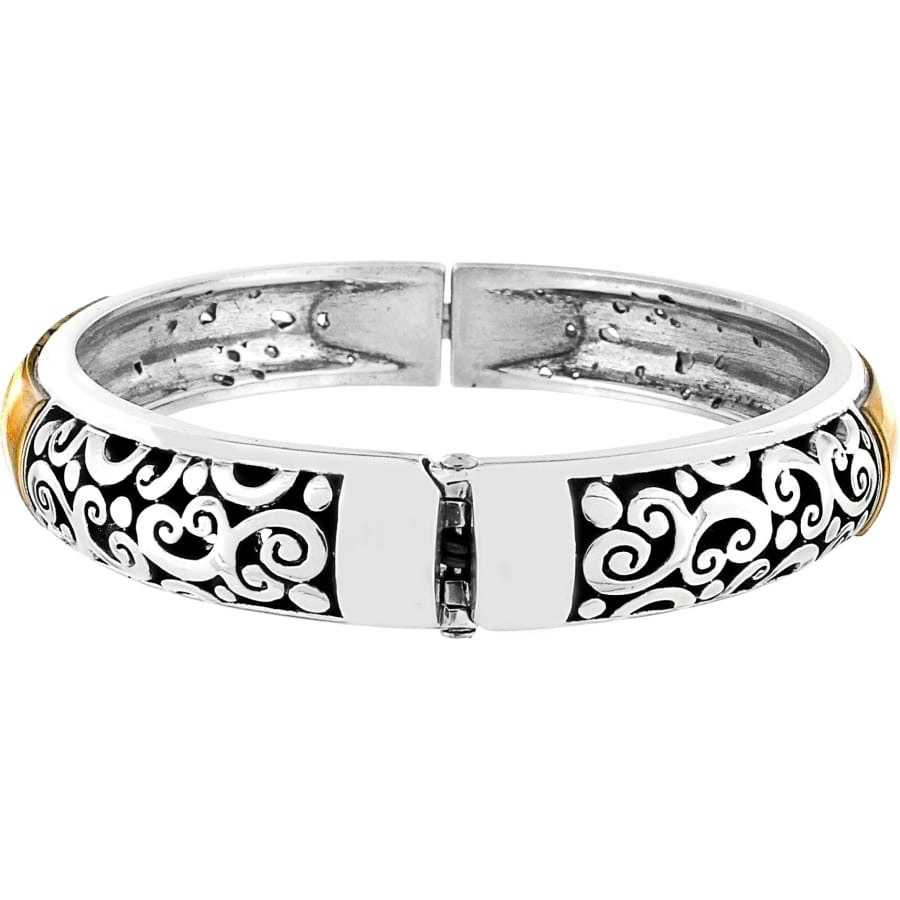 Brighton hinged bangle bracelet with silver-plated scroll filigree design and gold-plated side accents on a white background