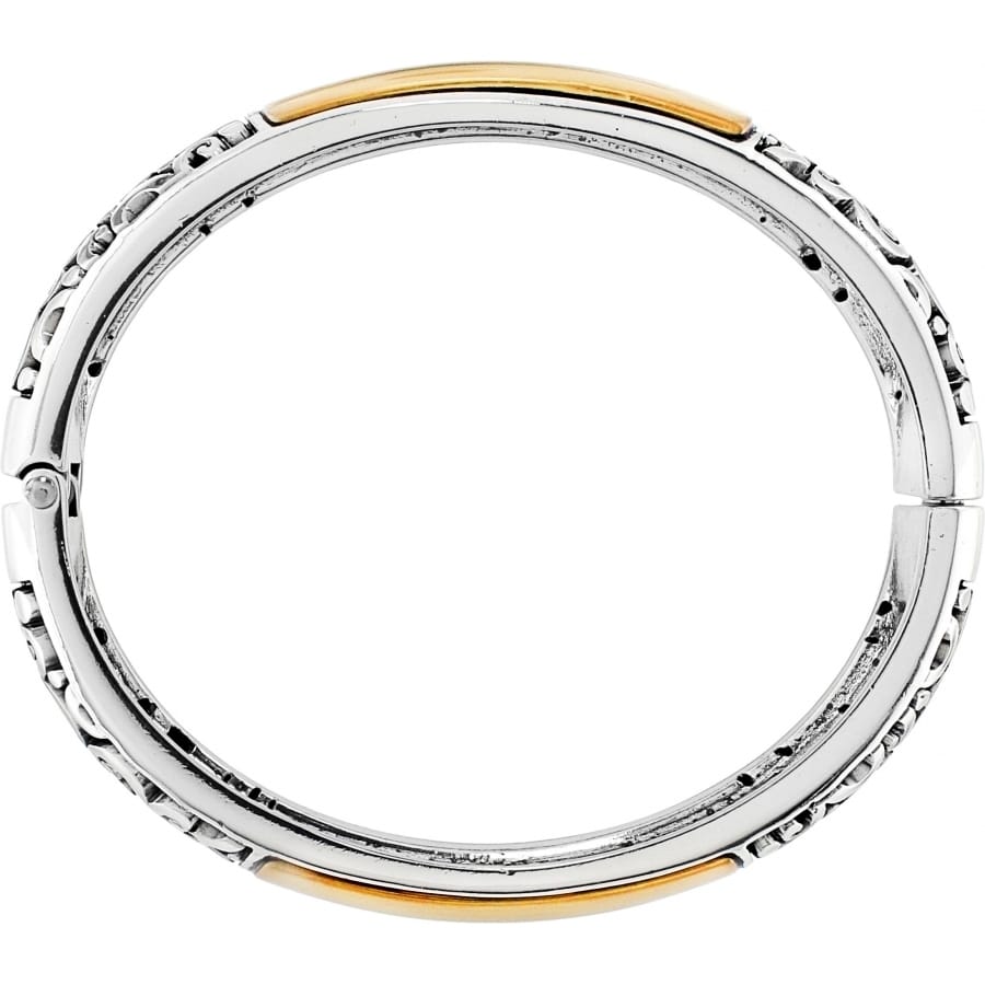 Brighton hinged bangle bracelet with silver-plated scrollwork band and gold-plated accents shown from above on a white background