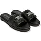Brighton slide sandals with black woven leather straps and silver-tone knot hardware accent on a white background