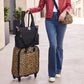 Model with a Brighton black quilted tote and leopard print rolling luggage, styled with a leopard pouch