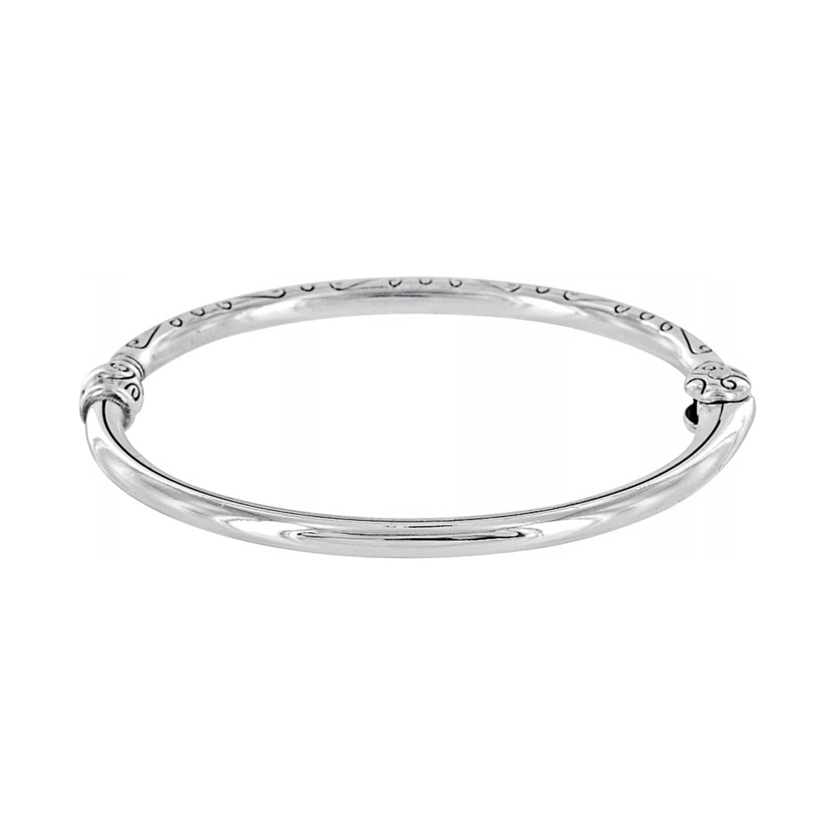 Brighton bangle bracelet with silver-plated finish and engraved scroll detailing along the top on a white background