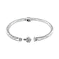 Brighton bangle bracelet shown open with silver-plated finish, engraved scroll detail, and decorative ball clasp on a white background