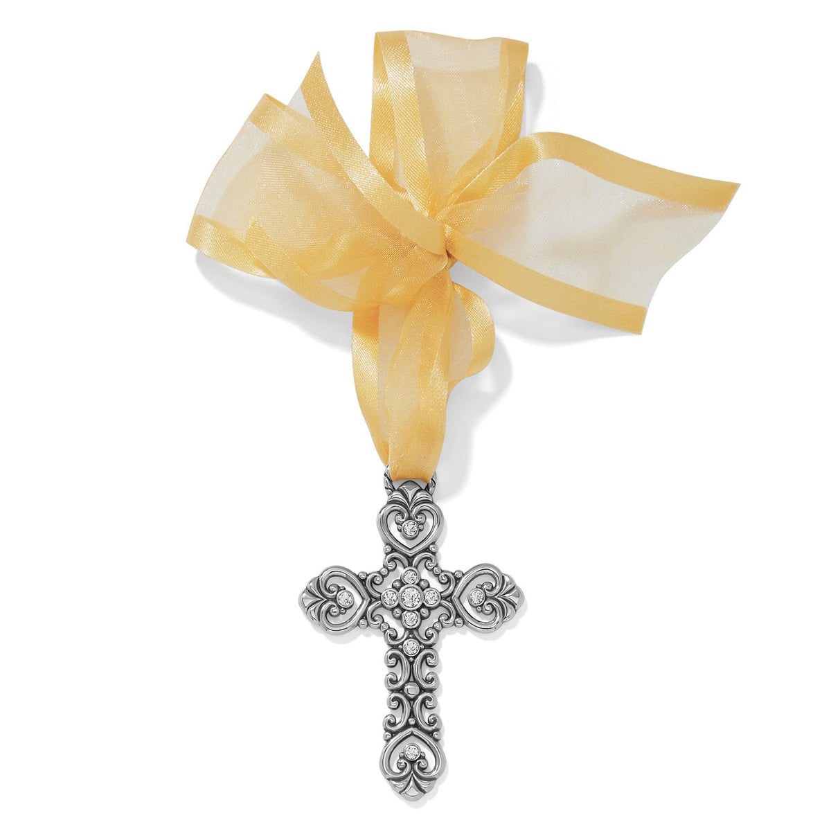 Brighton silver-plated cross ornament with scrollwork, heart details, crystal accents, and sheer gold ribbon on a white background