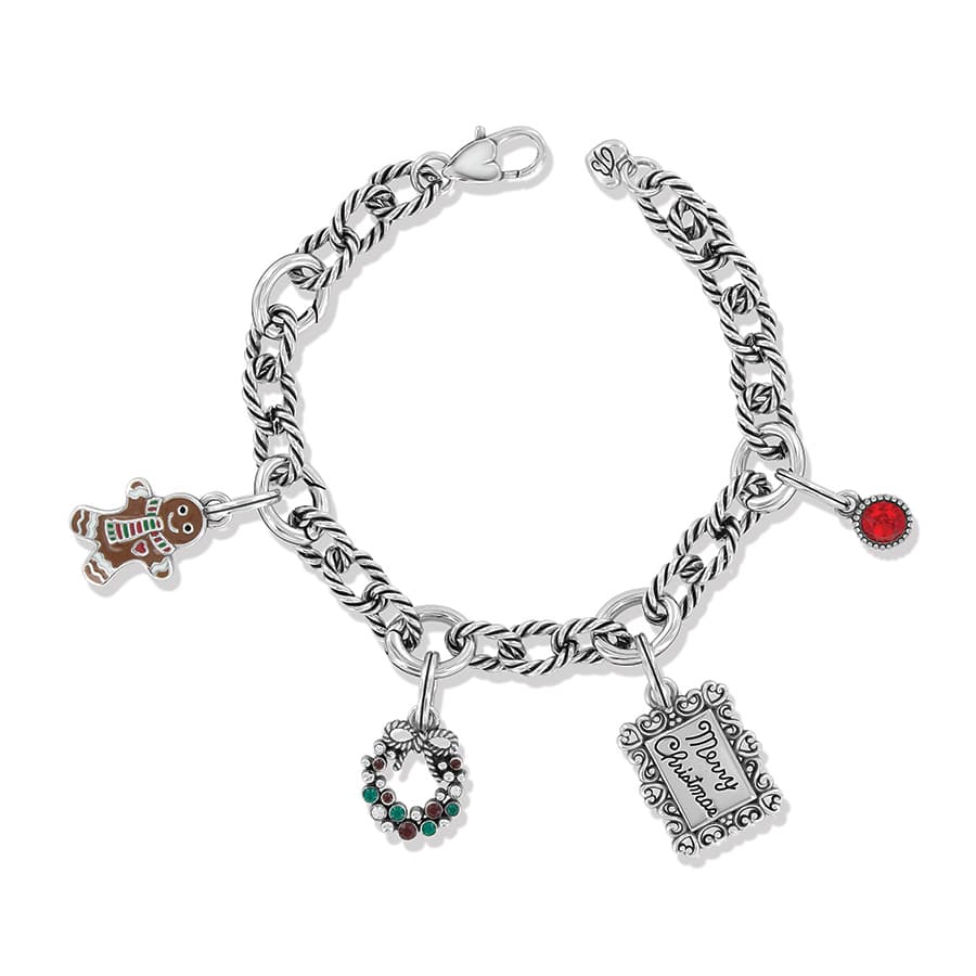 Brighton charm bracelet with gingerbread man, wreath, Merry Christmas frame, and red crystal charms on a white background