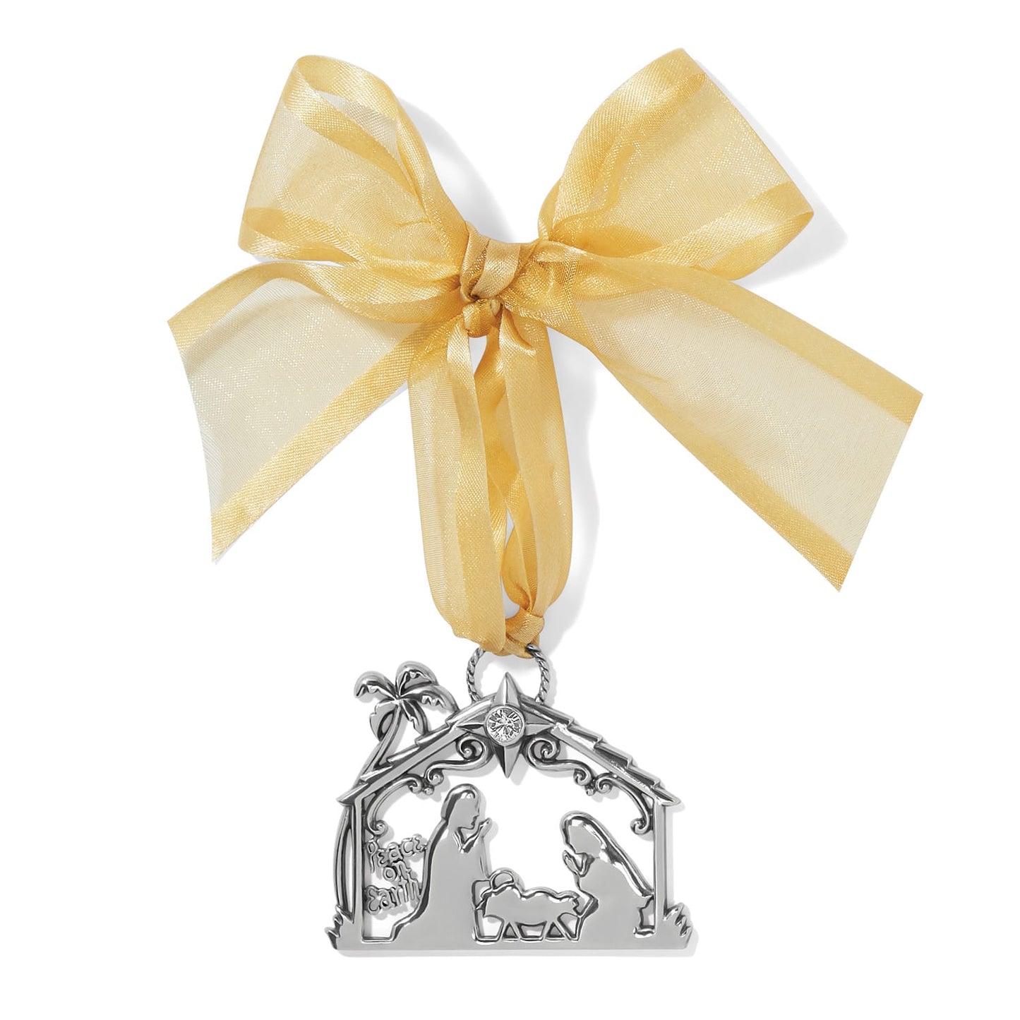 Brighton silver-plated nativity ornament with Peace on Earth cutout, crystal star, and gold organza bow on a white background
