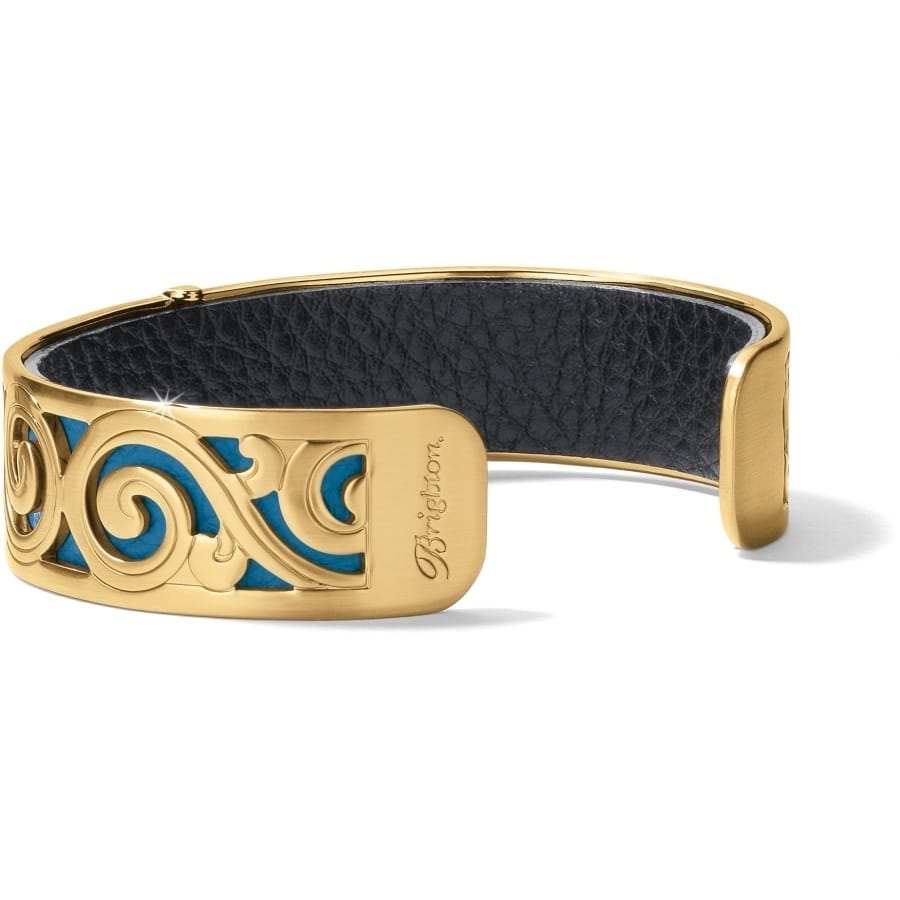 Brighton cuff bracelet with gold-plated scroll design over turquoise inlay and black leather interior on a white background