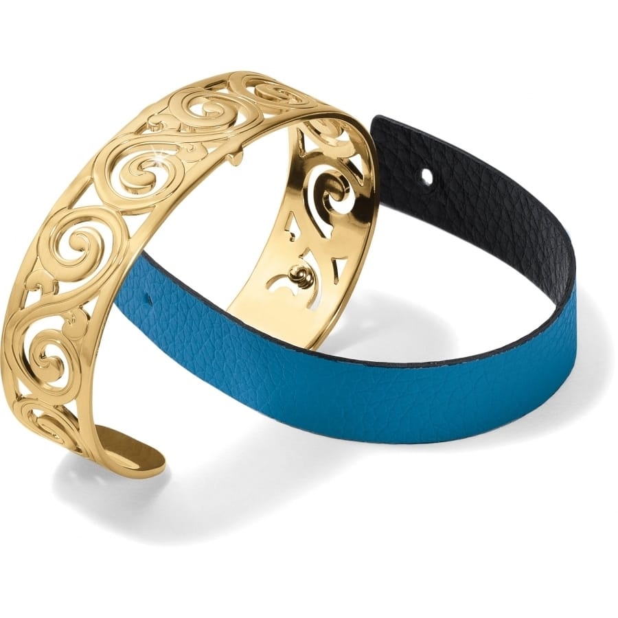 Brighton cuff bracelet with gold-plated scrollwork design and blue leather band on a white background