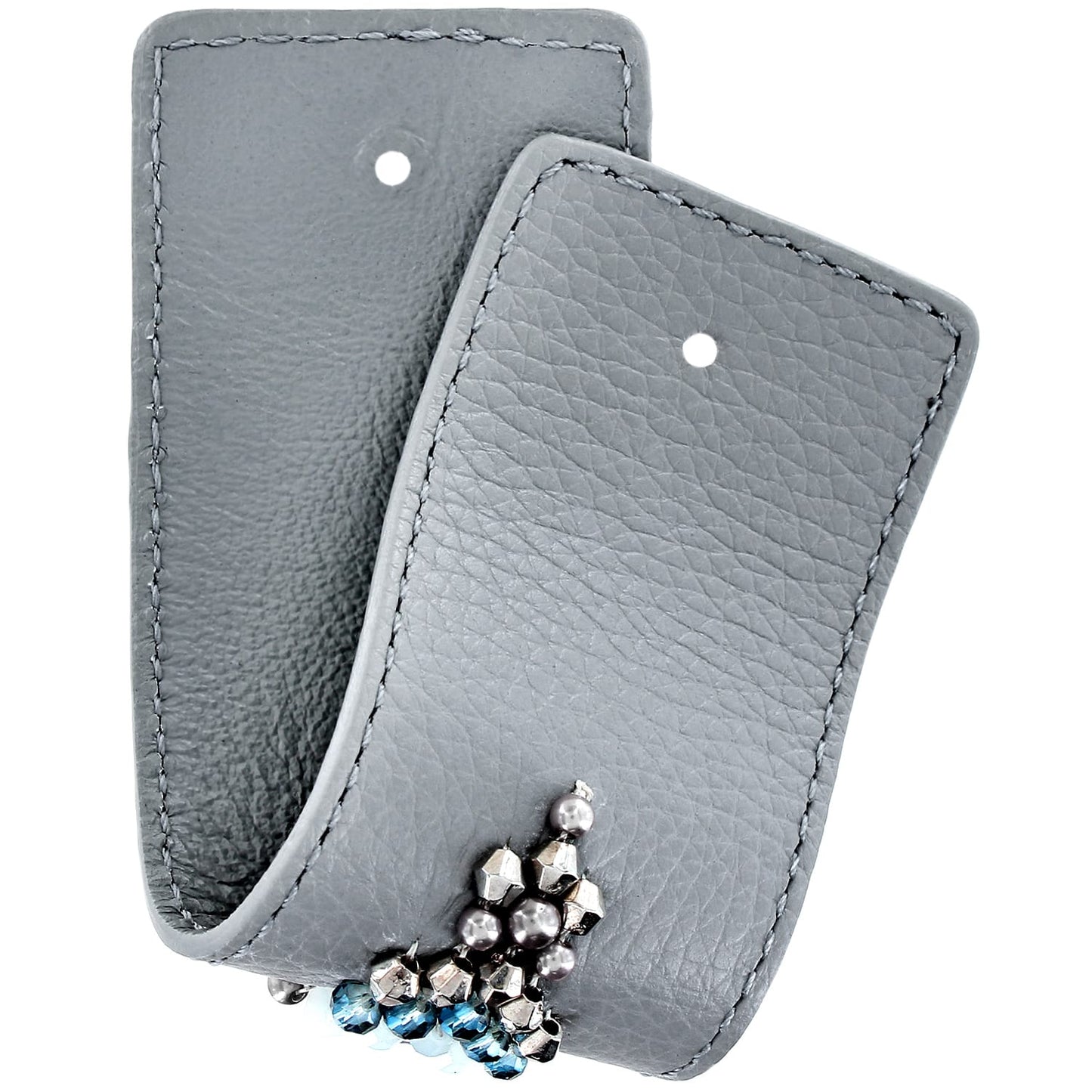 Brighton gray leather jewelry pouches with stitched edges and blue crystal beaded earrings peeking out on a white background