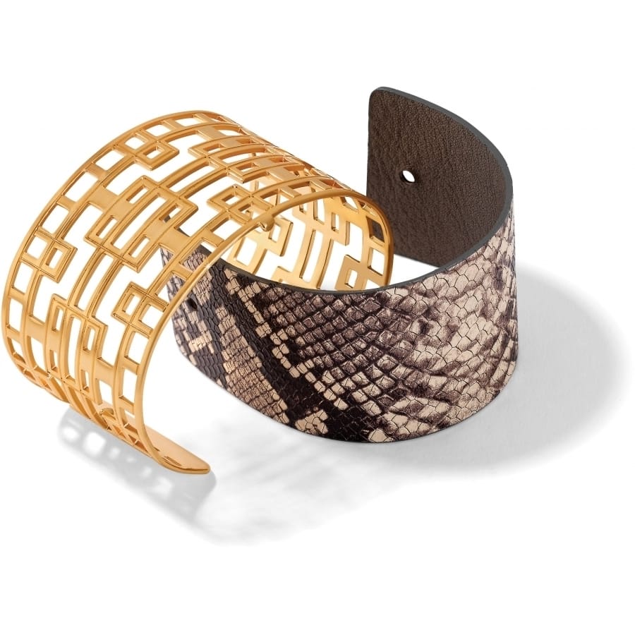 Brighton cuff bracelet with gold-plated geometric cutout design and snakeskin-print leather interior on a white background