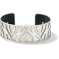 Brighton cuff bracelet with silver-plated cutout petal design over cream and black leather interior on a white background
