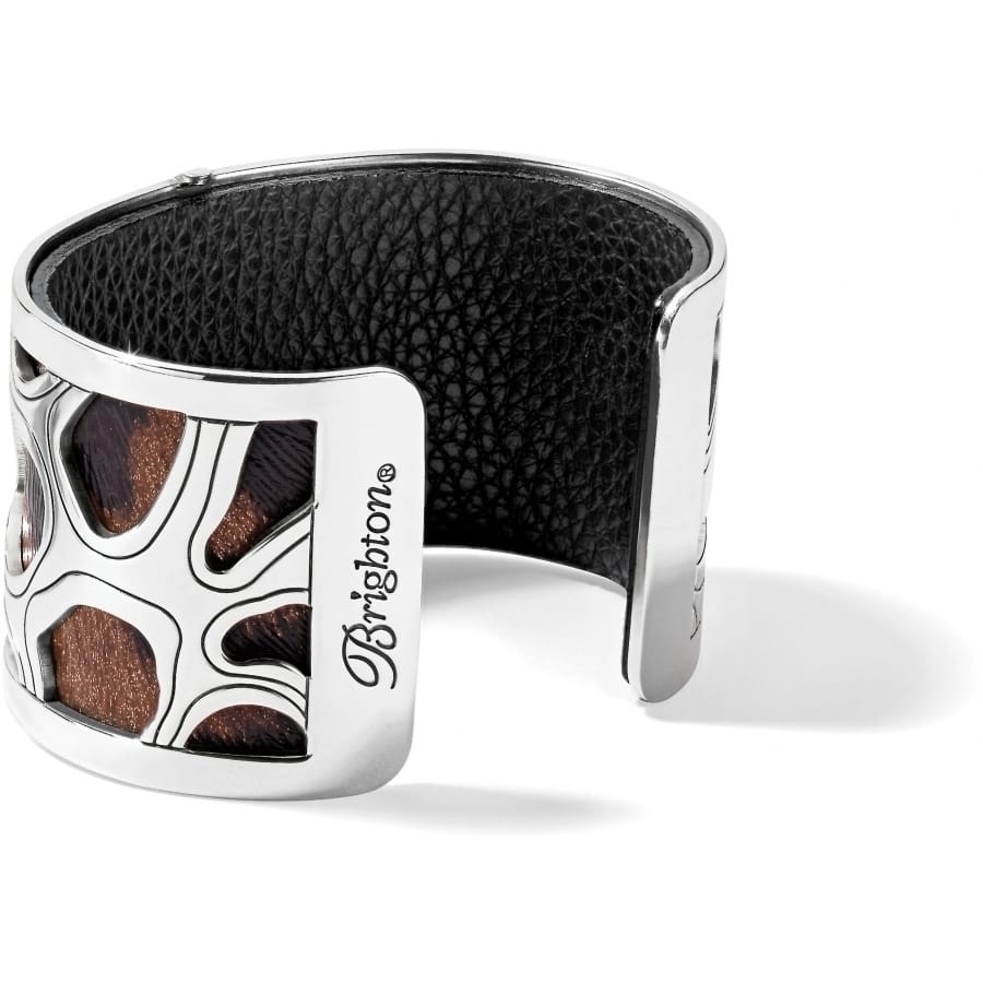 Brighton cuff bracelet shown from the back with silver-plated frame, black leather interior, and brown cutout panels on a white background