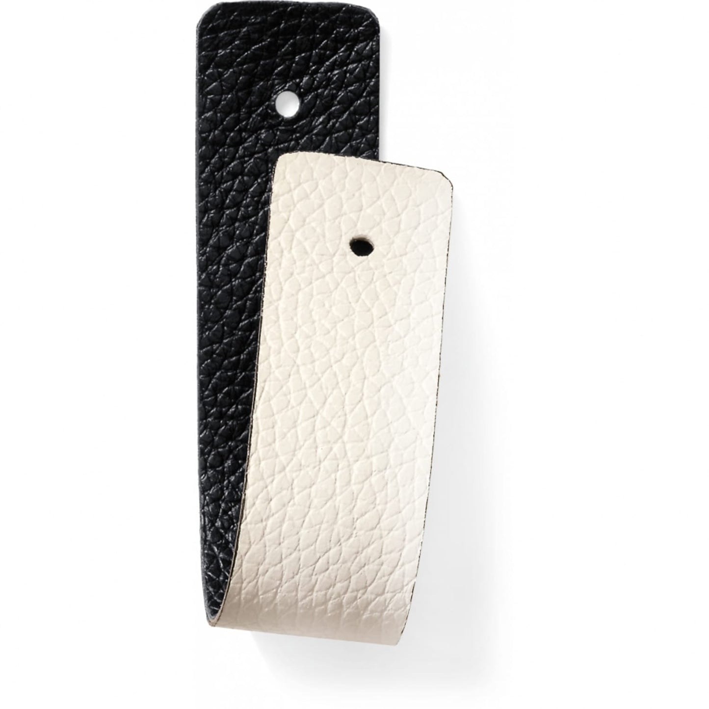 Brighton reversible leather belt strap shown in black and cream pebbled textures with punched holes on a white background