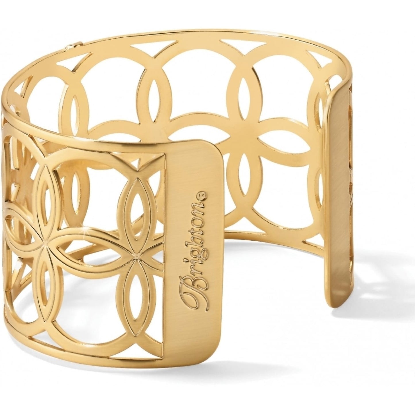 Brighton cuff bracelet with gold-plated floral cutout pattern and engraved logo plate on a white background