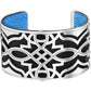 Brighton cuff bracelet with silver-plated geometric openwork over black leather and blue leather interior on a white background