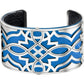 Brighton cuff bracelet with silver-plated openwork design over blue leather and black interior on a white background