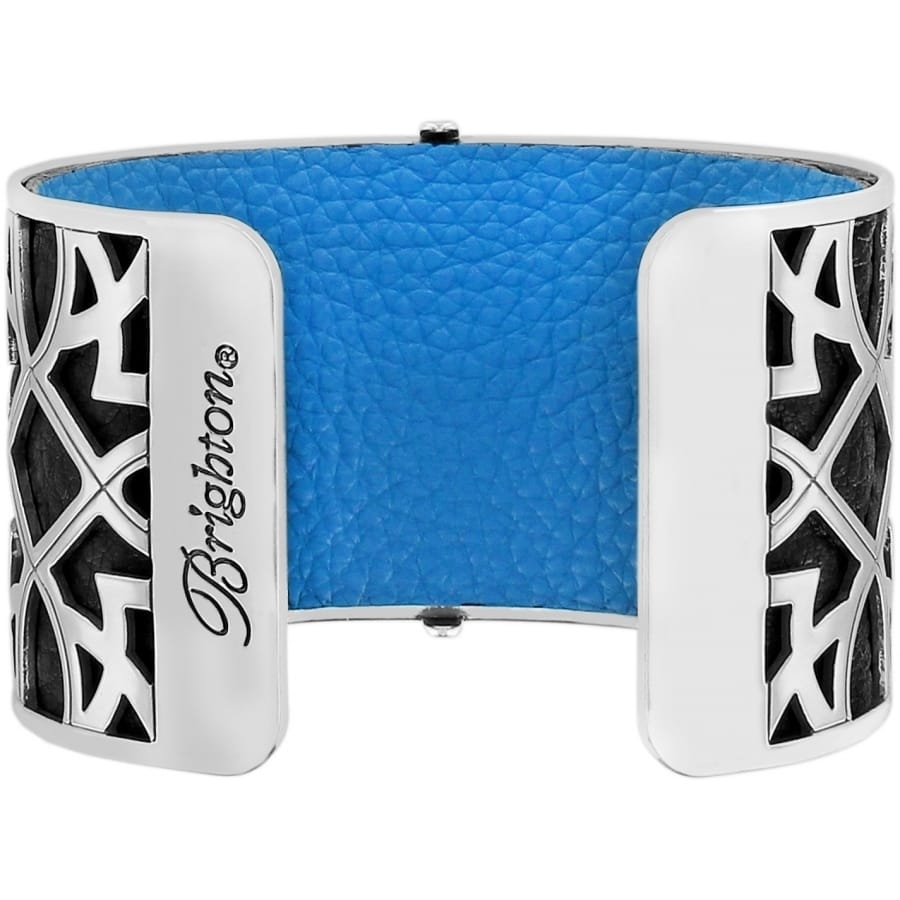 Brighton silver-plated wide cuff bracelet with blue leather insert and geometric cutout side panels on a white background
