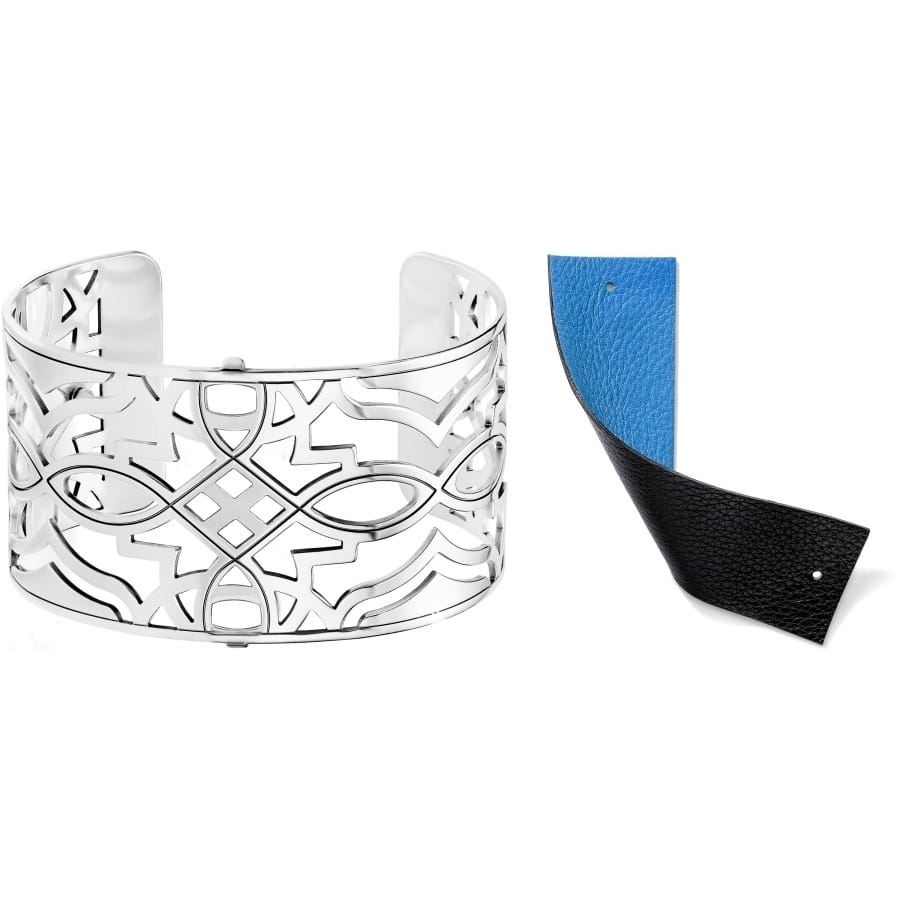 Brighton silver-plated cuff bracelet with openwork geometric design and reversible blue and black leather insert on a white background