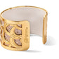 Brighton gold-plated cuff bracelet with scalloped cutout design, snakeskin leather insert, and engraved logo on a white background