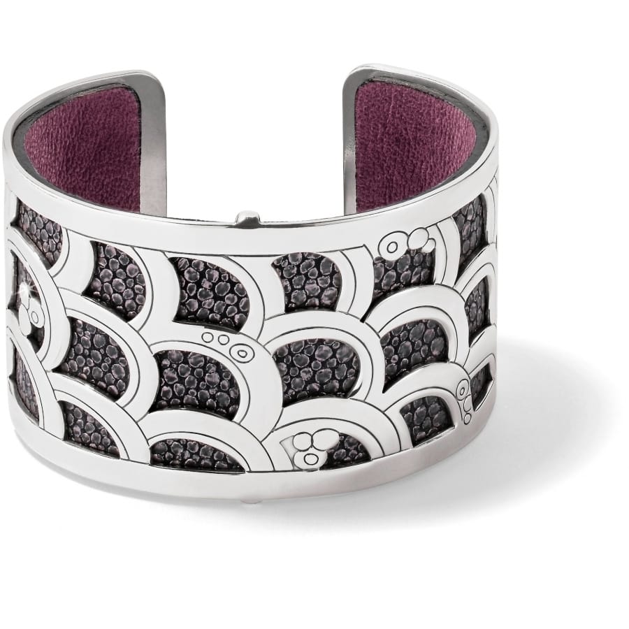 Brighton silver-plated cuff bracelet with scalloped textured pattern and purple leather insert on a white background