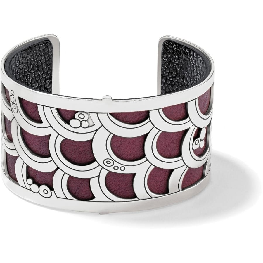 Brighton cuff bracelet with silver-plated scalloped overlay and purple leather insert on a white background