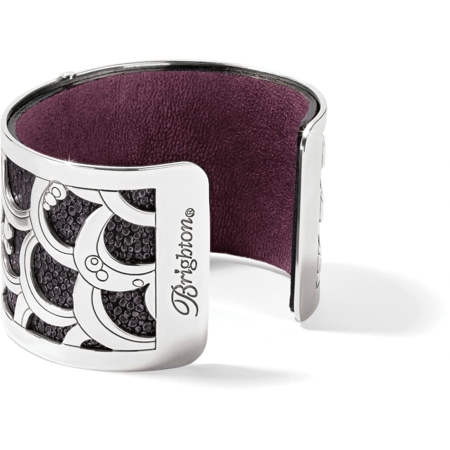Brighton silver-plated cuff bracelet with scalloped cutout design and purple leather interior on a white background