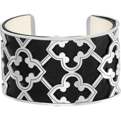Brighton cuff bracelet with black leather inlay and silver-plated quatrefoil lattice overlay on a white background