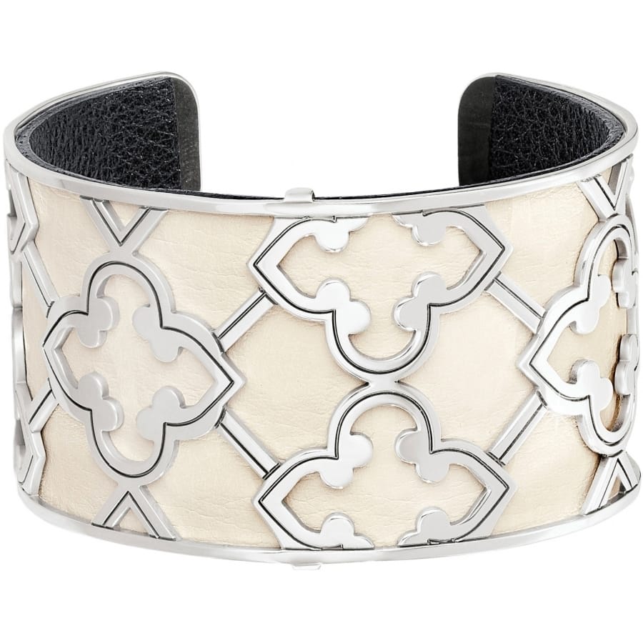 Brighton cuff bracelet with silver-plated quatrefoil scrollwork over cream leather inlay on a white background