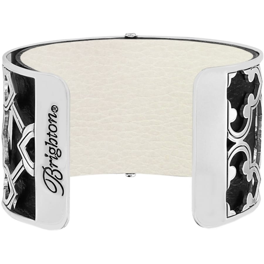 Brighton cuff bracelet with white leather center panel and silver-plated scroll cutout side details on a white background