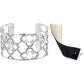 Brighton cuff bracelet with silver-plated floral openwork design and reversible black and cream leather insert on a white background