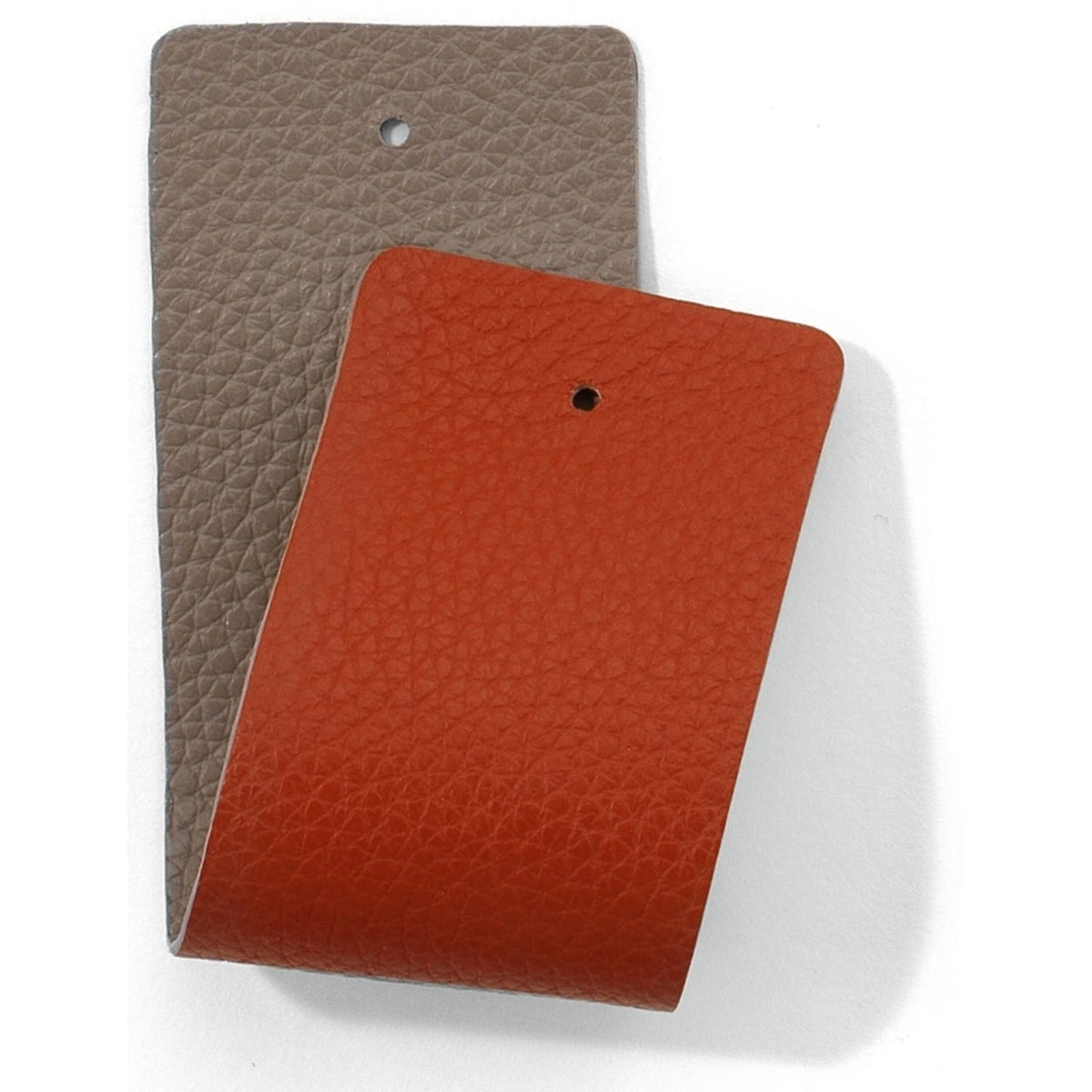 Brighton leather swatch samples in taupe and orange with pebbled texture and punched holes on a white background