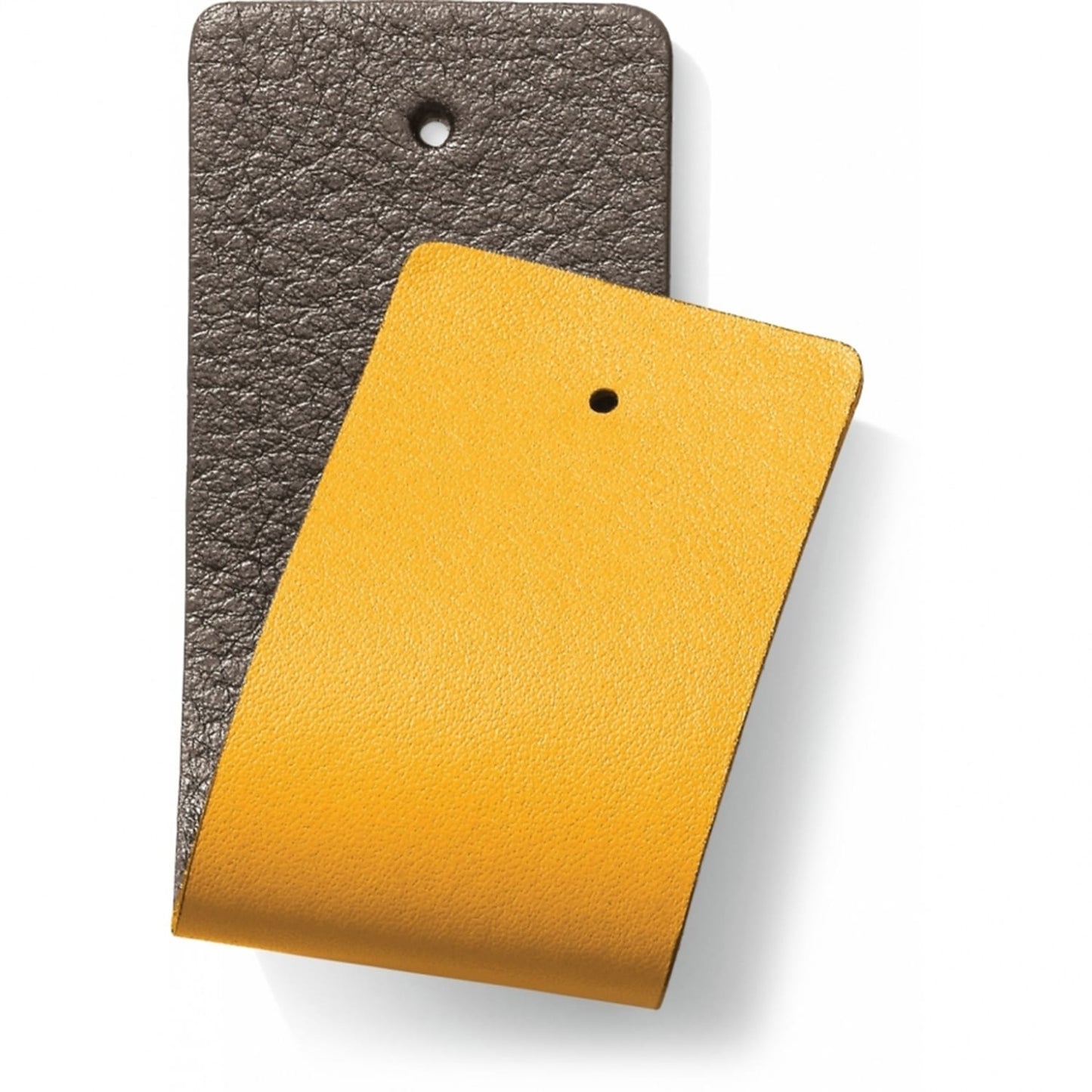Brighton leather swatch samples in dark brown and yellow with pebbled texture and punched holes on a white background