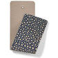 Brighton leather swatch samples in taupe pebbled texture and navy speckled finish on a white background