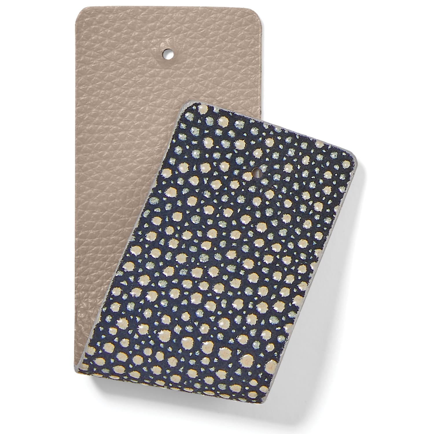 Brighton leather swatch samples in taupe pebbled texture and navy speckled finish on a white background