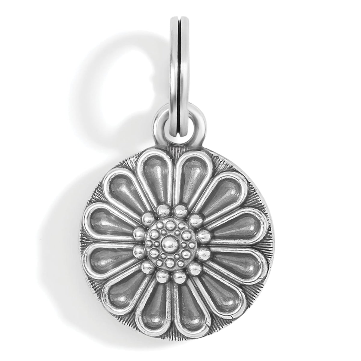 Brighton flower charm with silver-plated round medallion featuring layered petal design and beaded center on a white background