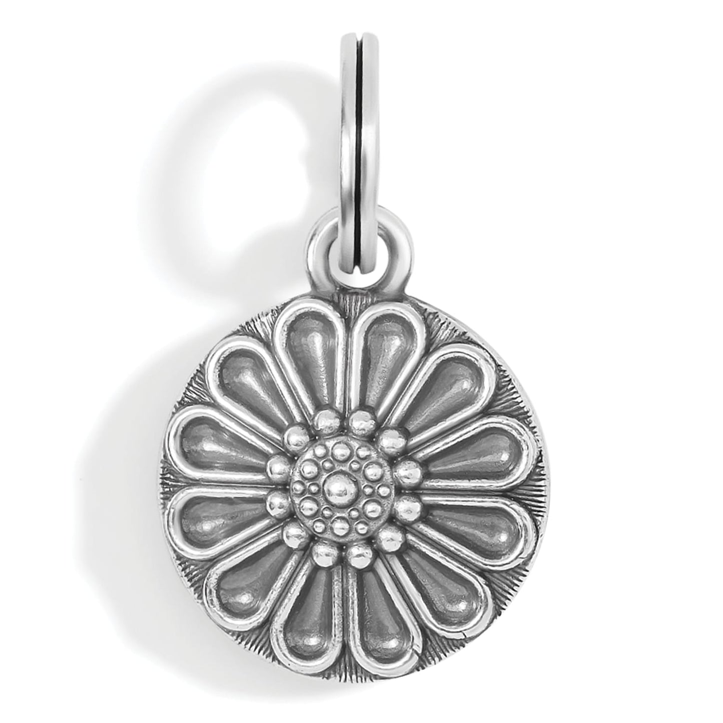 Brighton flower charm with silver-plated round medallion featuring layered petal design and beaded center on a white background