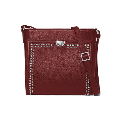 Brighton crossbody handbag in dark red leather with silver-tone studded trim and adjustable strap on a white background